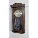 OAK ARTS & CRAFTS STYLE WALL CLOCK WITH SILVERED DIAL & GLASS PANEL DOOR