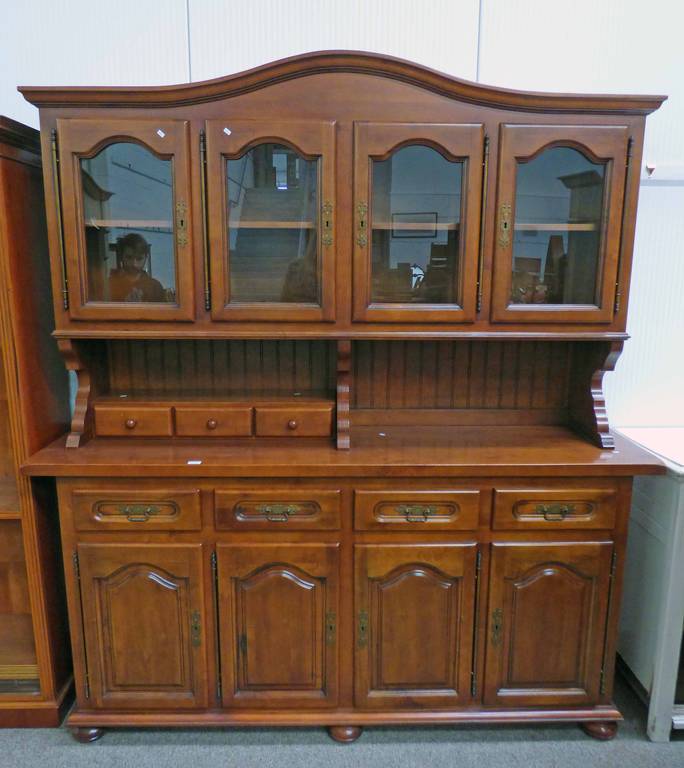 20TH CENTURY HARDWOOD DRESSER WITH 4 GLAZED PANEL DOORS OVER 4 DRAWERS OVER 4 PANEL DOORS 18.