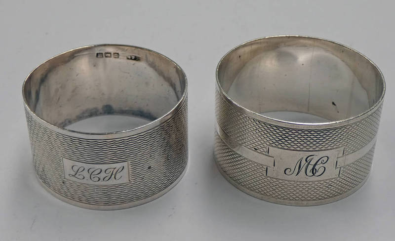 2 ENGINE TURNED SILVER NAPKIN RINGS - 48G