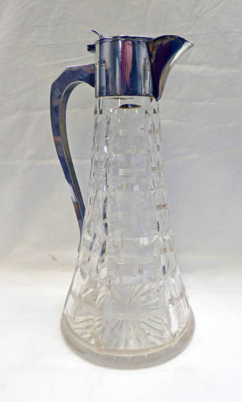 SILVER MOUNTED CUT GLASS CLARET JUG,