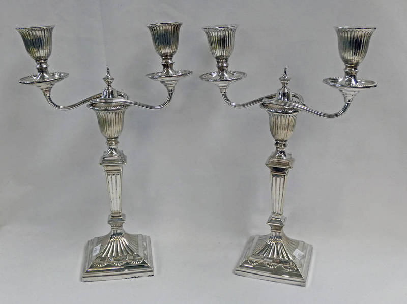 PAIR OF SILVER PLATED TWIN BRANCH CANDELABRA ON SQUARE BASES - 30.