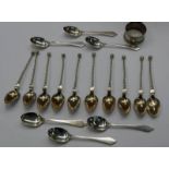 9 WHITE METAL SPOONS WITH SPIRAL STEMS MARKED 13 1/3 MH,