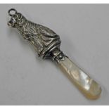 SILVER DOG SHAPED CHILDS RATTLE WITH MOTHER OF PEARL HANDLE,