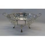 SILVER 2-HANDLED DISH WITH PIERCED PANELS & 4 SPLAYED LEGS,