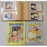 ALBUM OF LUCIE ATTWELL POSTCARDS TOGETHER WITH 2 LUCIE ATTWELL ANNUALS
