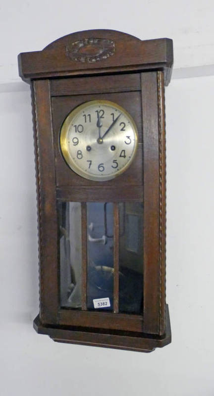 OAK ARTS & CRAFTS STYLE WALL CLOCK WITH SILVERED DIAL & GLASS PANEL DOOR