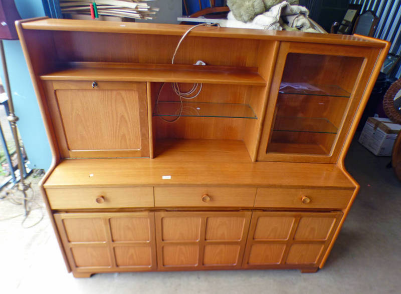 NATHAN TEAK UNIT WITH FALL FRONT PANEL AND GLASS PANEL DOOR OVER BASE OF 3 DRAWERS OVER 3 PANEL