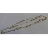 FANCY LINK LONG CHAIN NECKLACE WITH BALL & SPAR LINKS, THE CLASP STAMPED 585 ITALY - 29.