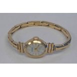 9CT GOLD LADIES WRISTWATCH ON 9CT GOLD BRACELET - 12.