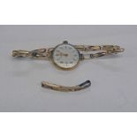 9CT GOLD LADIES ROTARY WRISTWATCH ON A 9CT GOLD EXPANDING BRACELET - 11.