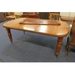 19TH CENTURY MAHOGANY EXTENDING DINING TABLE WITH 2 EXTRA LEAVES ON TURNED SUPPORTS AS FOUND.