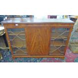 MAHOGANY BOOKCASE WITH PANEL DOOR AND 2 ASTRAGAL GLASS PANEL DOORS ON BRACKET SUPPORTS,
