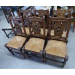 SET OF 6 LATE 19TH CENTURY OAK WHEEL BACK DINING CHAIRS WITH RUSH SEATS ON TURNED SUPPORTS