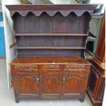 18TH CENTURY OAK WELSH DRESSER WITH PLATE RACK BACK OVER BASE OF 3 DRAWERS OVER 2 PANEL DOORS ON