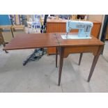 MAHOGANY CASED SINGER SEWING MACHINE ON SQUARE SUPPORTS