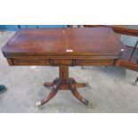 CROSS BANDED MAHOGANY GAMES TABLE WITH FOLD OVER TOP ON CENTRAL PEDESTAL,