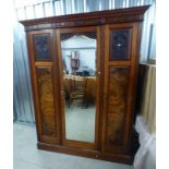 LATE 19TH CENTURY MAHOGANY WARDROBE WITH MIRROR DOOR FLANKED BY DOOR EACH SIDE,