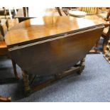 19TH CENTURY OAK DROP LEAF TABLE ON BARLEY TWIST SUPPORTS