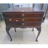 MAHOGANY 3 DRAWER CANTEEN ON QUEEN ANNE SUPPORTS,
