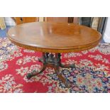 19TH CENTURY WALNUT OVAL TOPPED BREAKFAST TABLE ON TURNED COLUMNS