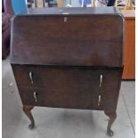 MAHOGANY BUREAU WITH FALL-FRONT OVER 2 DRAWERS ON SHAPED SUPPORTS,