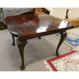 MAHOGANY PULL-OUT DINING TABLE ON QUEEN ANNE SUPPORTS