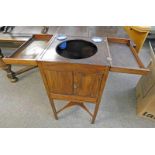 19TH CENTURY MAHOGANY WASH STAND WITH LIFT UP TOP OVER 2 PANEL DOORS AND DRAWER ON SQUARE SUPPORTS.