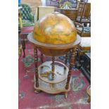 20TH CENTURY GLOBE COCKTAIL CABINET WITH LIFT-UP TOP,