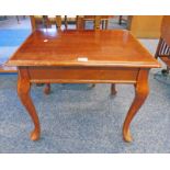 MAHOGANY LAMP TABLE WITH SINGLE DRAWER ON SHAPED SUPPORTS.