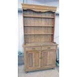 LATE 19TH CENTURY PINE WELSH DRESSER WITH SHELF BACK OVER 2 DRAWERS AND 2 PANEL DOORS ON TURNED