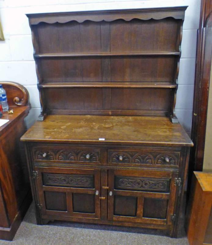 LATE 19TH CENTURY CARVED OAK WELSH DRESSER WITH PLATE RACK BACK OVER BASE OF 2 DRAWERS OVER 2 PANEL