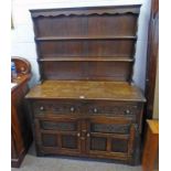 LATE 19TH CENTURY CARVED OAK WELSH DRESSER WITH PLATE RACK BACK OVER BASE OF 2 DRAWERS OVER 2 PANEL