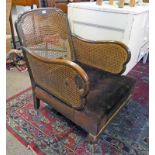 WALNUT AND BERGERE ARMCHAIR ON BALL & CLAW SUPPORTS