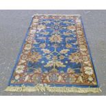 MIDDLE EASTERN CARPET WITH BLUE & BROWN DECORATION,