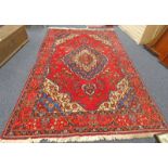 RED GROUND MIDDLE EASTERN CARPET 285 X 195 CM