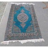 EASTERN RUG WITH BLUE DECORATION,