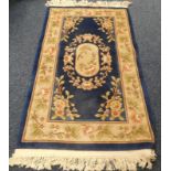 BLUE FLORAL DECORATED RUG,