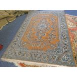 ORANGE GROUND MIDDLE EASTERN CARPET,