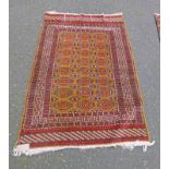 EASTERN RUG WITH MAROON & GOLD DECORATION,