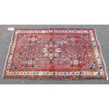 RED EASTERN RUG - 125 X 74 CMS