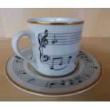 TIFFANY & CO TEACUP AND SAUCER "MOON RIVER"