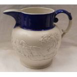 19TH CENTURY STONEWARE JUG WITH BLUE GLAZED RIM & HUNTING SCENE DECORATION - 19CM TALL