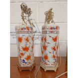 PAIR OF ORIENTAL HEXAGONAL VASE TABLE LAMPS WITH RED FLORAL DECORATIONS,