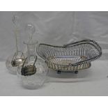 2 CUT GLASS DECANTERS & 4 SILVER BOTTLE LABELS AND A SILVER PLATED SWING HANDLED WIRE BASKET