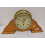 BRASS CASED SHIPS WALL CLOCK BY SMITHS MOUNTED ON A WOODEN BASE