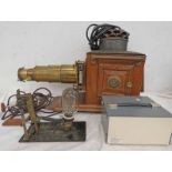 MAGIC LANTERN WITH GILT METAL EXTENDING LENS ON A WOOD AND METAL BODY,