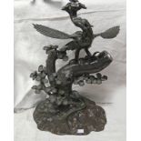 BRONZE FIGURE OF A PHOENIX ON BRANCH WITH FOLIAGE