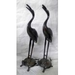 PAIR OF JAPANESE BRONZE FIGURES OF A CRANE ON THE BACK OF A TORTOISE