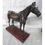 BRONZE FIGURE OF A HORSE ON WOODEN PLINTH 33 CM TALL Condition Report: Repair to one