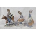 2 LLADRO PORCELAIN FIGURES INCLUDING BOY WITH COW, SEATED LADY & A NAO FIGURE OF A LADY WITH BASKET.